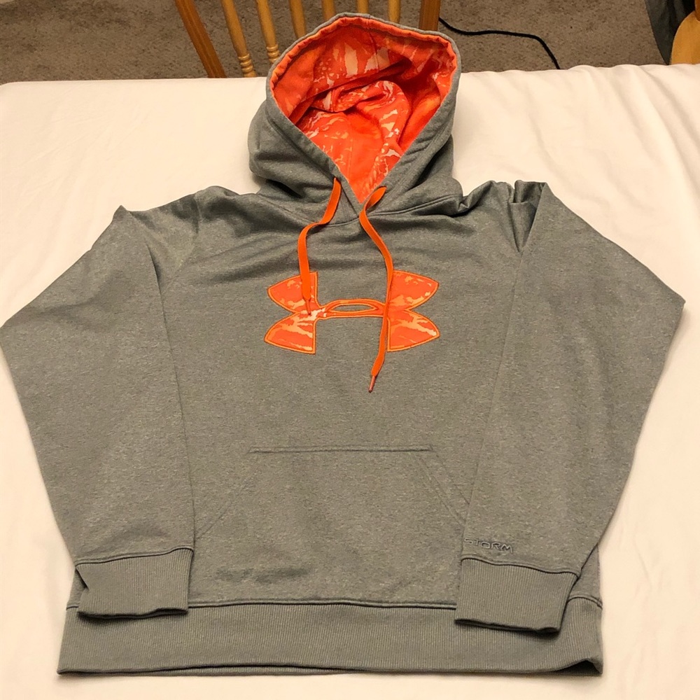 Under armour gray and orange sweatshirt.